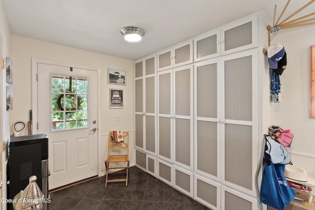 5143 W Crazy Creek Rd, Coeur Dalene, ID 83814 - entryway with dark tile patterned flooring