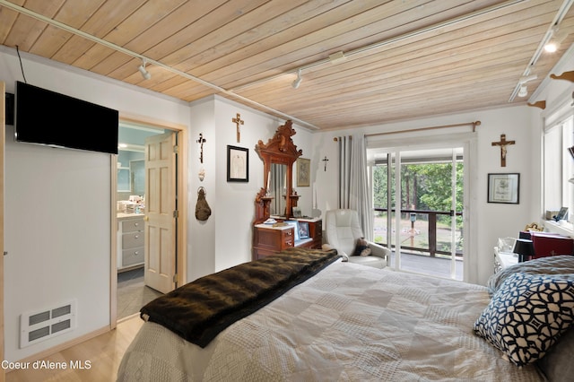 5143 W Crazy Creek Rd, Coeur Dalene, ID 83814 - bedroom with rail lighting, wooden ceiling, access to outside, and wood finished floors