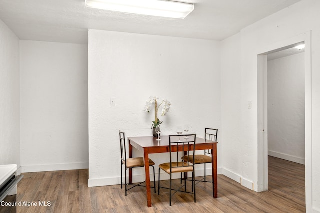 110 Cedar St, Priest River, ID 83856 - dining area with wood finished floors and baseboards