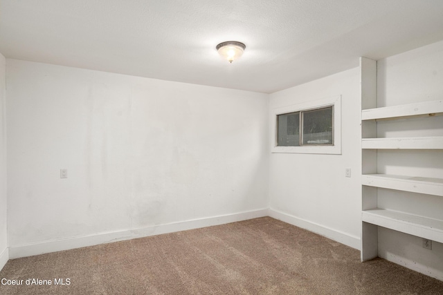 110 Cedar St, Priest River, ID 83856 - carpeted spare room featuring baseboards