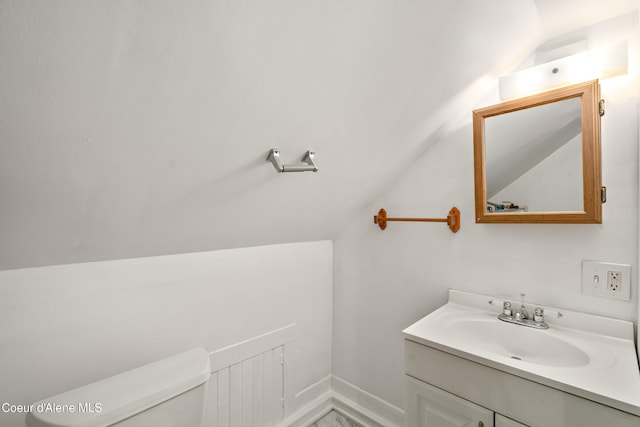 110 Cedar St, Priest River, ID 83856 - bathroom featuring vaulted ceiling and vanity