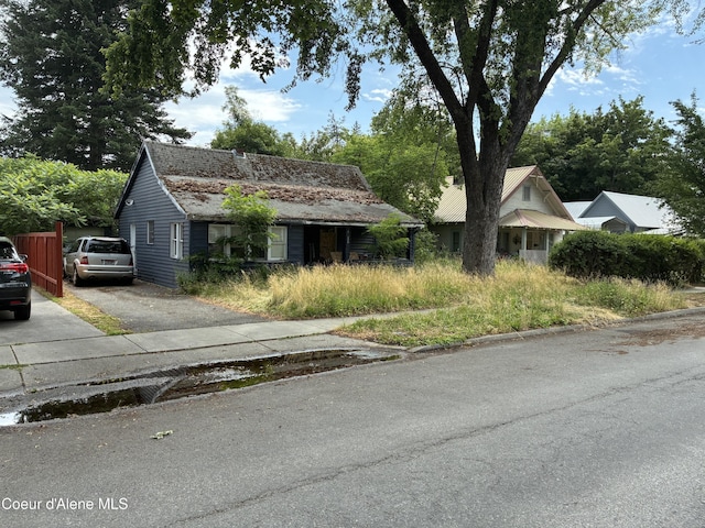 1138 N 7th St, Coeur Dalene, ID 83814 - view of front of home featuring driveway
