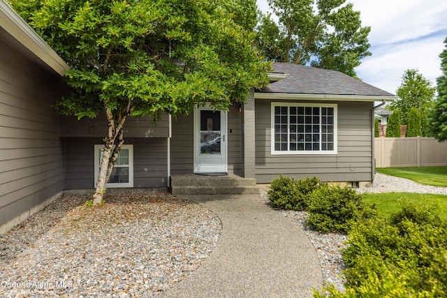 870 E Cloverleaf Dr, Hayden, ID 83835 - doorway to property with a shingled roof