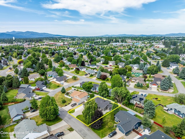 870 E Cloverleaf Dr, Hayden, ID 83835 - aerial view of residential area featuring mountains and property boundaries highlighted