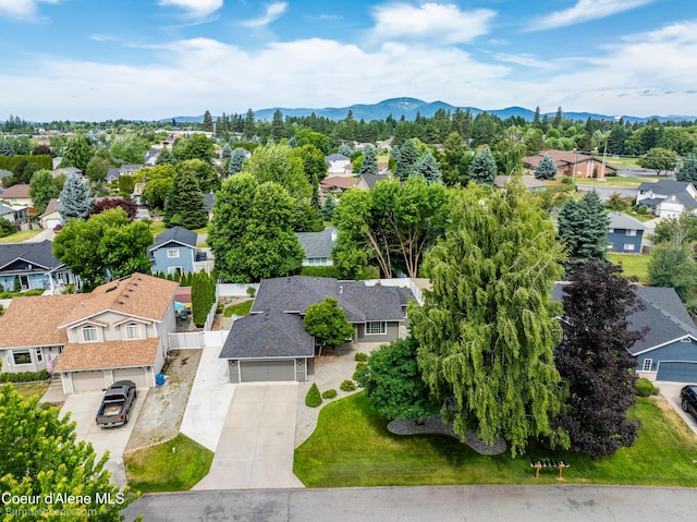 870 E Cloverleaf Dr, Hayden, ID 83835 - aerial perspective of suburban area with a mountain backdrop