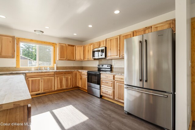 185 Leo Ln, Moyie Springs, ID 83845 - kitchen with stainless steel appliances, recessed lighting, light countertops, dark wood-type flooring, and light brown cabinetry