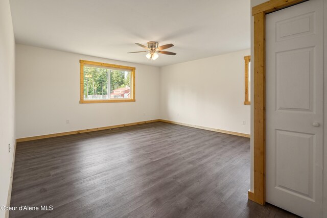 185 Leo Ln, Moyie Springs, ID 83845 - spare room with ceiling fan and dark wood-type flooring