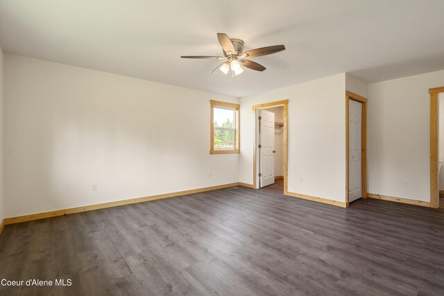 185 Leo Ln, Moyie Springs, ID 83845 - unfurnished bedroom featuring dark wood-style flooring and ceiling fan