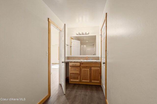 185 Leo Ln, Moyie Springs, ID 83845 - bathroom with vanity, wood finished floors, and a shower