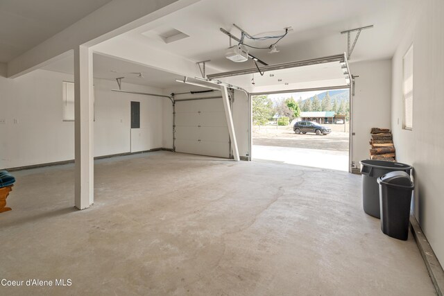 185 Leo Ln, Moyie Springs, ID 83845 - garage with electric panel and a garage door opener