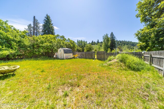 219 E 4th St, Oldtown, ID 83822 - fenced backyard with a shed