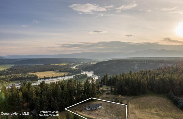 156 Promise Ln, Moyie Springs, ID 83845 - view of mountain backdrop featuring a large body of water