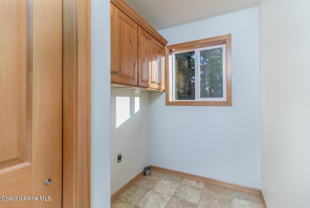 156 Promise Ln, Moyie Springs, ID 83845 - washroom with electric dryer hookup and cabinet space