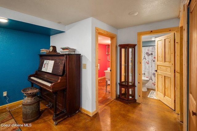 26443 S Farup Rd, Worley, ID 83876 - hallway with finished concrete flooring and baseboards