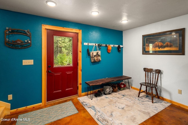 26443 S Farup Rd, Worley, ID 83876 - foyer entrance with baseboards and concrete floors