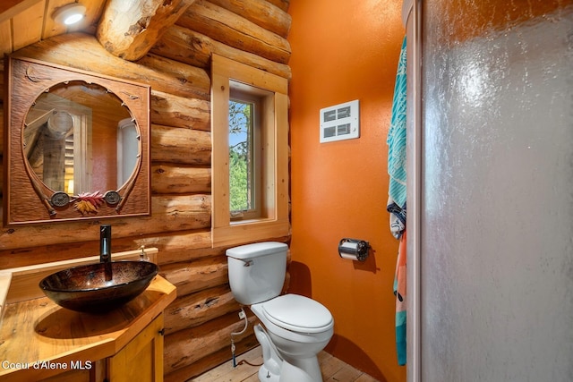 26443 S Farup Rd, Worley, ID 83876 - full bathroom featuring log walls and vanity