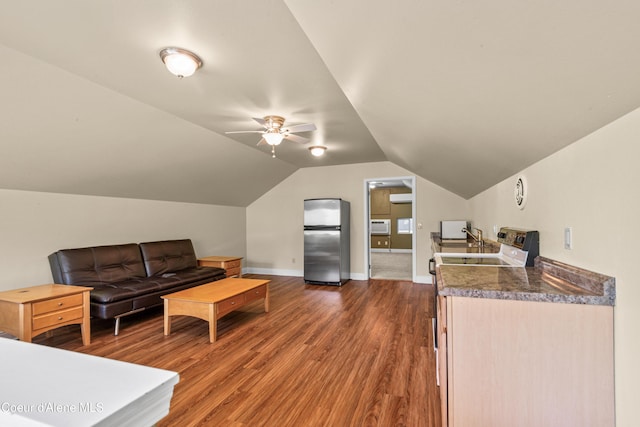 822 Ridgewood, Kamiah, ID 83536 - living room with wood finished floors, a ceiling fan, lofted ceiling, and an AC wall unit