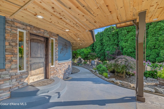 822 Ridgewood, Kamiah, ID 83536 - doorway to property featuring stone siding