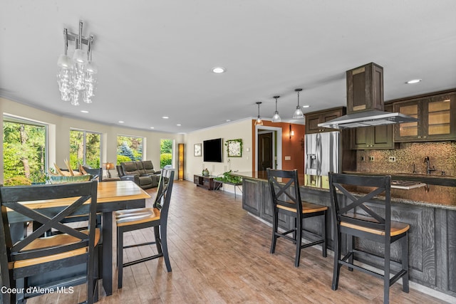 822 Ridgewood, Kamiah, ID 83536 - dining room with recessed lighting, light wood finished floors, ornamental molding, and a chandelier