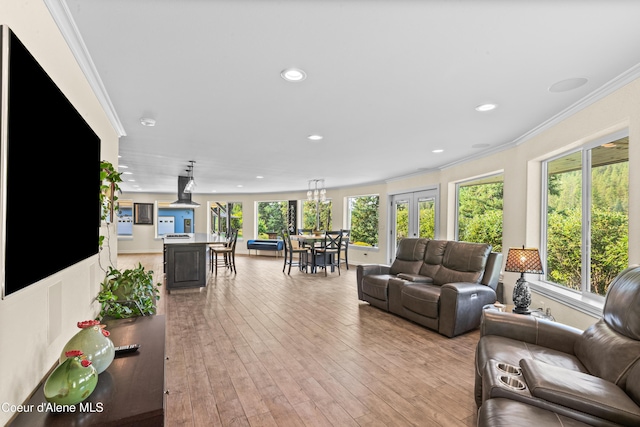 822 Ridgewood, Kamiah, ID 83536 - living room featuring crown molding, light wood-type flooring, and recessed lighting