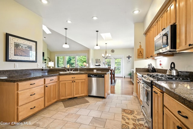 30 Beacon Hill Rd, Cocolalla, ID 83813 - kitchen featuring stainless steel appliances, a skylight, healthy amount of natural light, pendant lighting, and recessed lighting