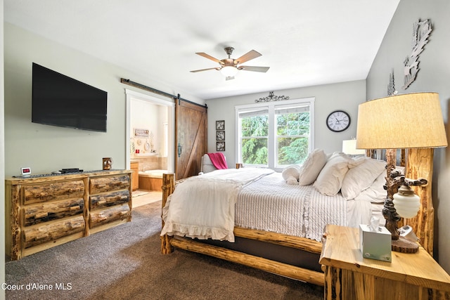 30 Beacon Hill Rd, Cocolalla, ID 83813 - bedroom with a barn door, carpet floors, connected bathroom, and a ceiling fan
