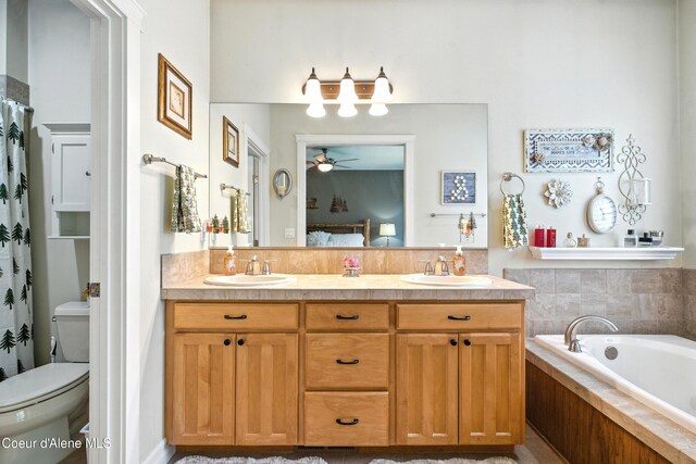 30 Beacon Hill Rd, Cocolalla, ID 83813 - ensuite bathroom featuring a bath, a ceiling fan, and double vanity