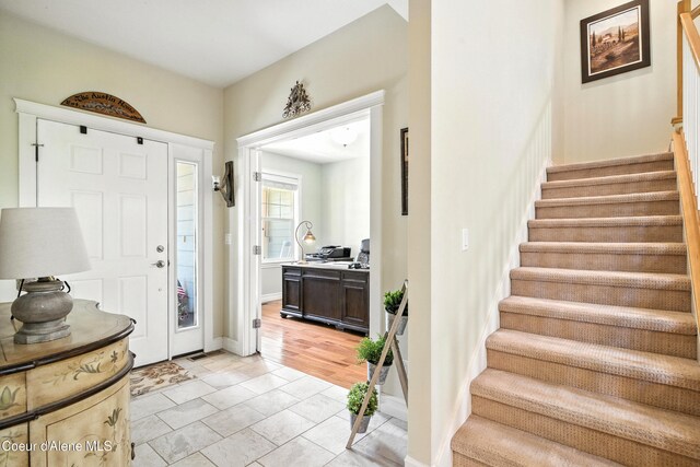 30 Beacon Hill Rd, Cocolalla, ID 83813 - foyer entrance featuring stairway and baseboards