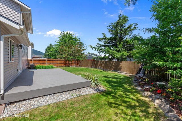14106 N Lauren Loop, Rathdrum, ID 83858 - fenced backyard with a deck