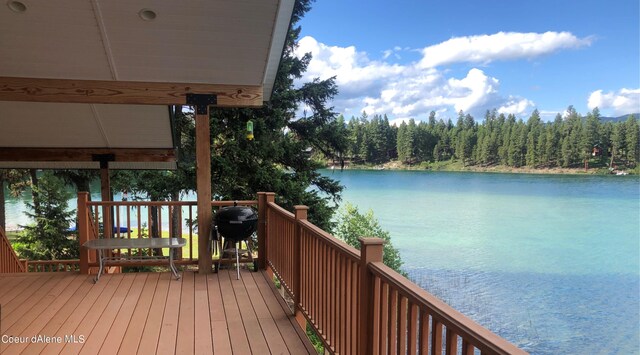 1349 Lakeshore Dr, Libby, MT 59923 - deck with a water view, grilling area, and a wooded view