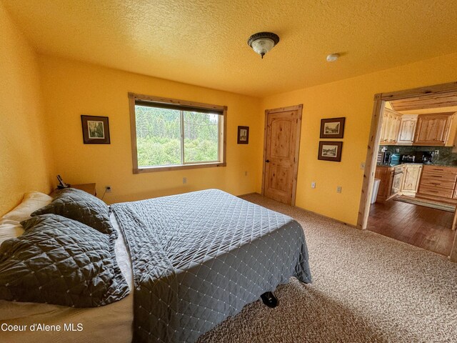 1349 Lakeshore Dr, Libby, MT 59923 - bedroom with carpet flooring and a textured ceiling