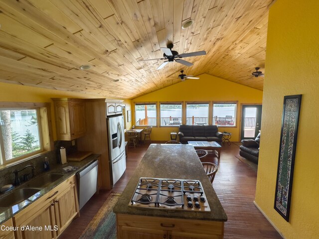 1349 Lakeshore Dr, Libby, MT 59923 - kitchen with dishwashing machine, stainless steel gas stovetop, wood ceiling, vaulted ceiling, and dark countertops