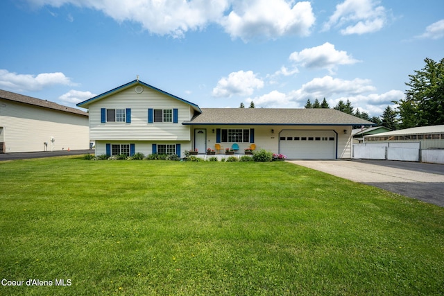 9270 N Maple St, Hayden, ID 83835 - split level home with a garage and driveway