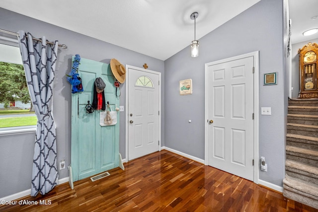 9270 N Maple St, Hayden, ID 83835 - entryway with vaulted ceiling, wood finished floors, and stairs