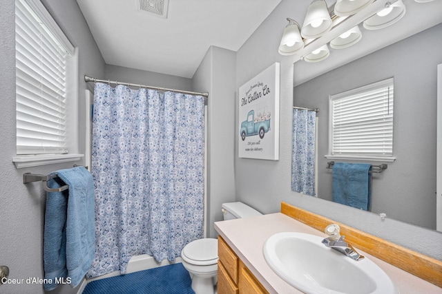 9270 N Maple St, Hayden, ID 83835 - full bath featuring vanity and a shower with curtain