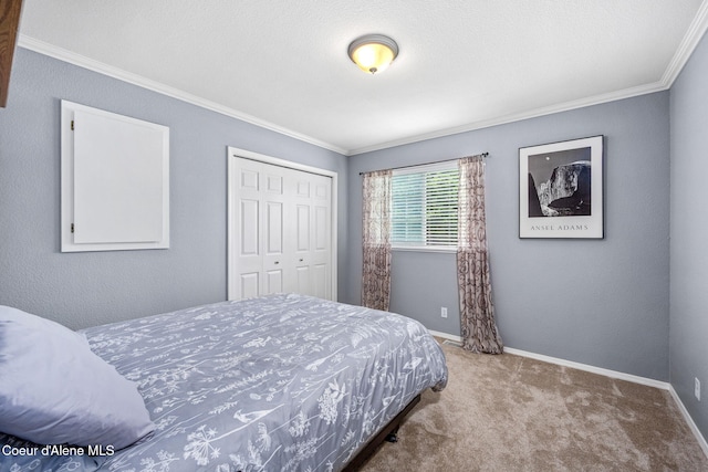 9270 N Maple St, Hayden, ID 83835 - carpeted bedroom with a closet and crown molding