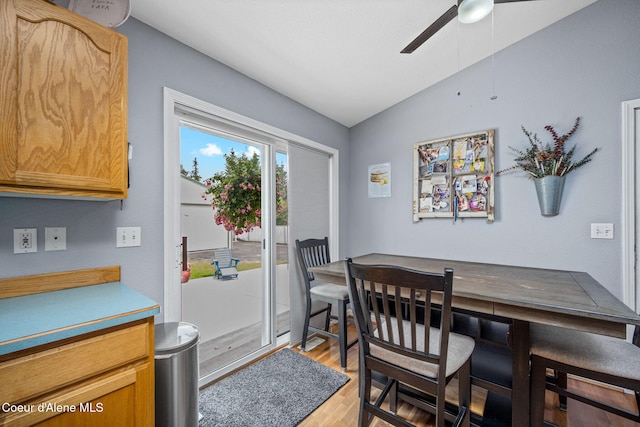 9270 N Maple St, Hayden, ID 83835 - dining area featuring light wood-type flooring, a ceiling fan, and lofted ceiling
