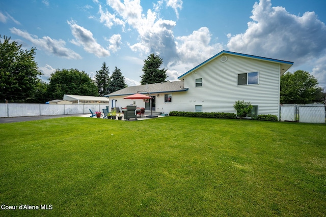 9270 N Maple St, Hayden, ID 83835 - rear view of property featuring a patio and a fenced backyard