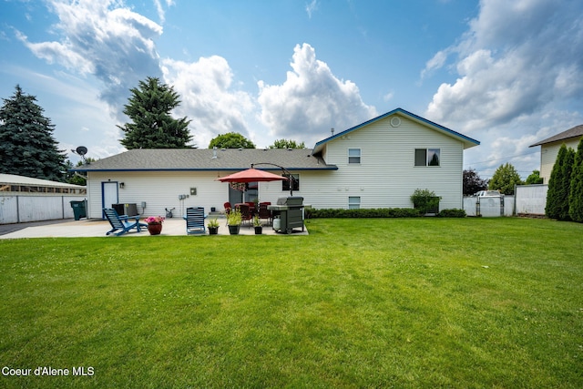 9270 N Maple St, Hayden, ID 83835 - rear view of house featuring a patio