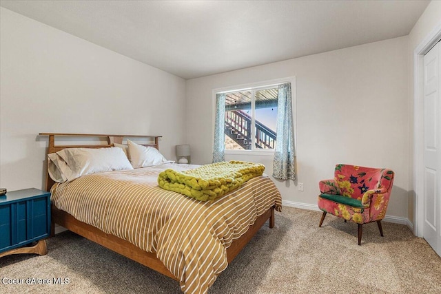 6101 Bottle Bay Rd, Sagle, ID 83860 - carpeted bedroom featuring baseboards