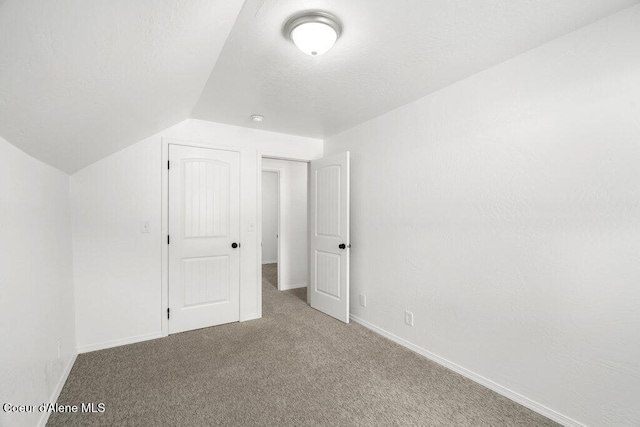 606 Residence St, Wallace, ID 83873 - additional living space featuring carpet flooring and lofted ceiling