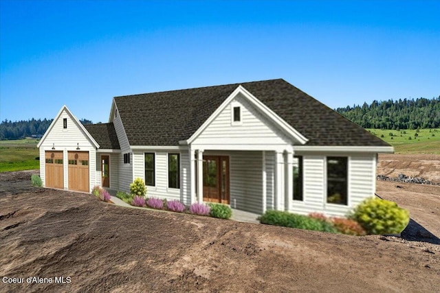 1047 Merideth Rd, Plummer, ID 83851 - modern inspired farmhouse featuring a garage, a porch, and driveway