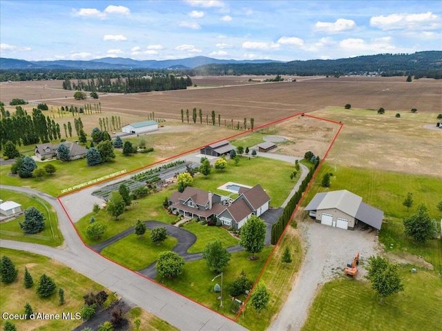 6744 E Greta Ave, Post Falls, ID 83854 - aerial view of sparsely populated area with property boundaries highlighted and mountains