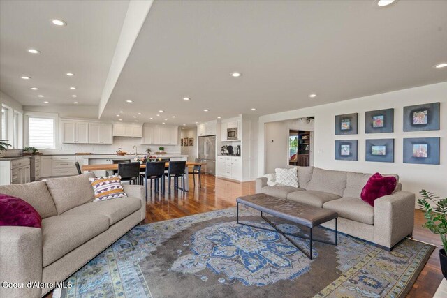 6744 E Greta Ave, Post Falls, ID 83854 - living area with wood finished floors and recessed lighting