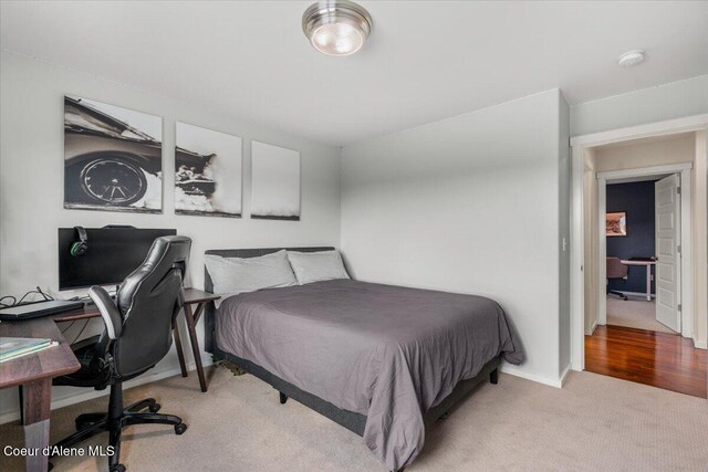 6744 E Greta Ave, Post Falls, ID 83854 - bedroom featuring light colored carpet and a desk