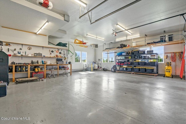 6744 E Greta Ave, Post Falls, ID 83854 - garage featuring a workshop area and a garage door opener