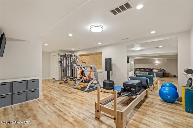 6744 E Greta Ave, Post Falls, ID 83854 - exercise room featuring light wood-style flooring and recessed lighting