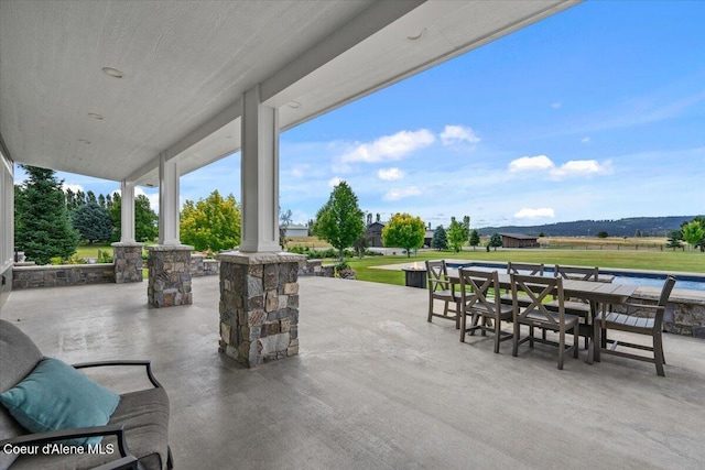 6744 E Greta Ave, Post Falls, ID 83854 - view of patio / terrace featuring outdoor dining space
