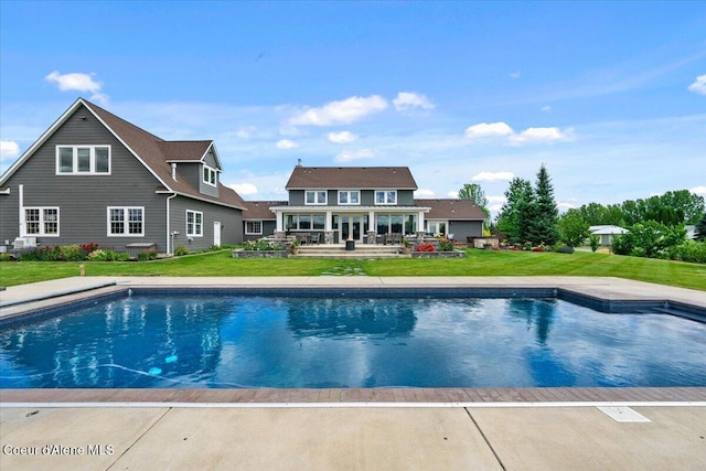 6744 E Greta Ave, Post Falls, ID 83854 - swimming pool with a yard and a patio