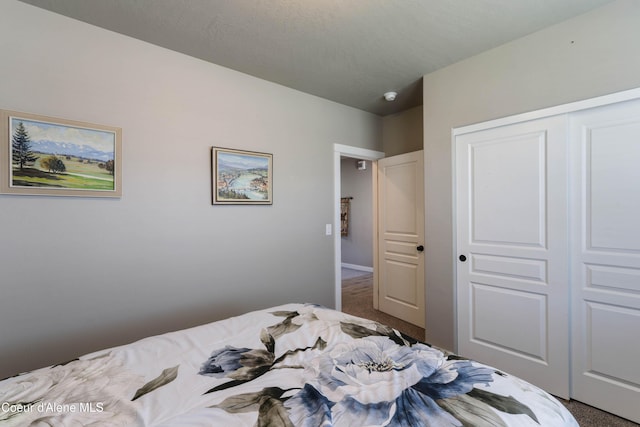 4574 N Connery Loop, Post Falls, ID 83854 - carpeted bedroom featuring a closet